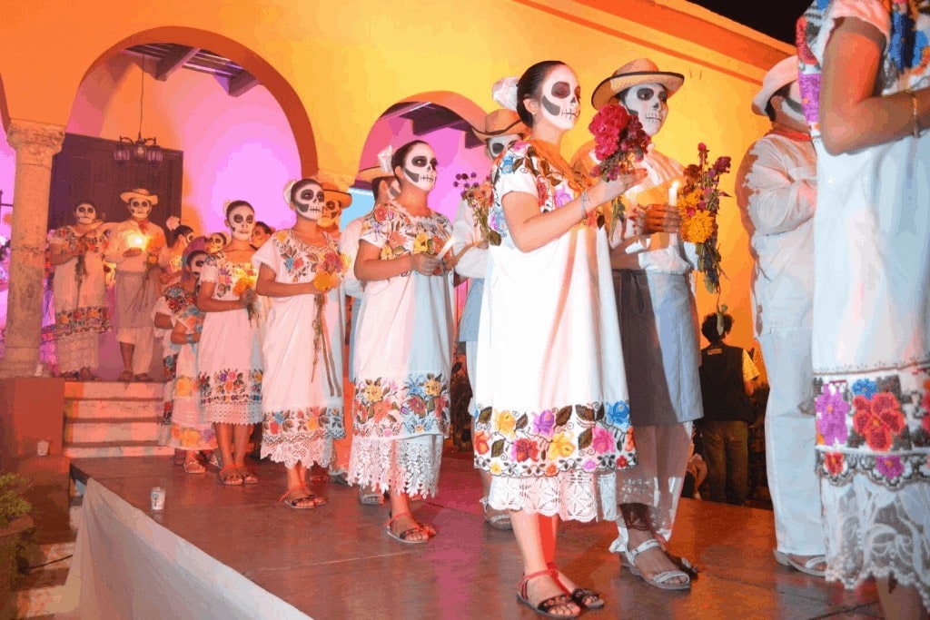 day of the dead procession with calaveras