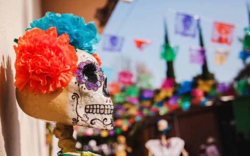 Day of the Dead has everything to do with the afterlife, love and those  colorful skulls you've seen around