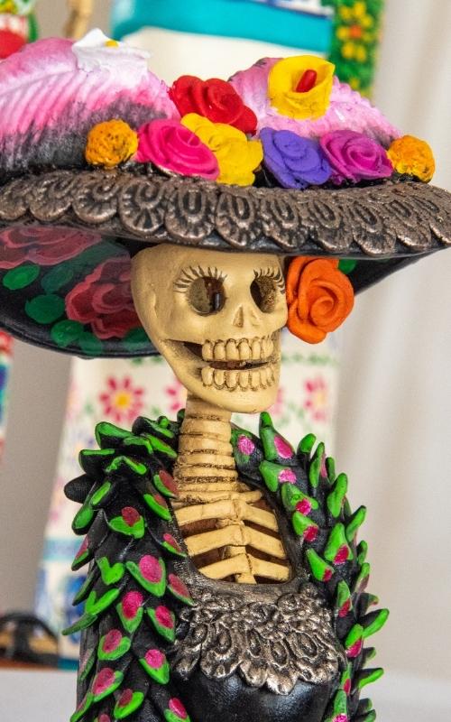 Day of the Dead has everything to do with the afterlife, love and those  colorful skulls you've seen around